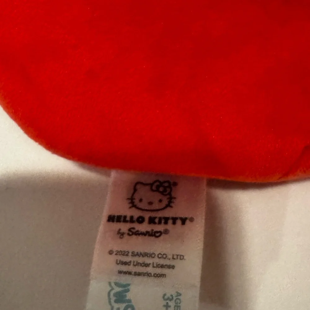 Hello Kitty Plush with Heart-Shaped Red Sunglasses
